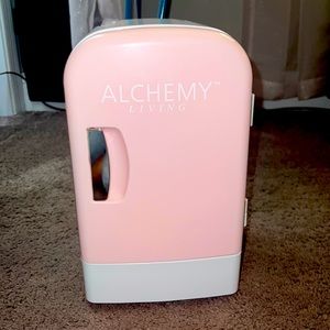 I am selling a pink Alchemy Living Self Care mini fridge.